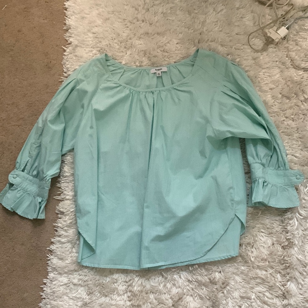 real and white stripped blouse. size XL but fits like a medium.